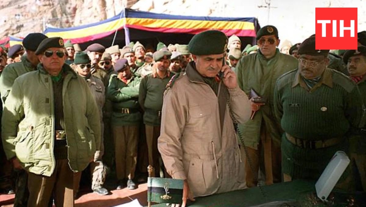 General V.P. Malik, Indian Army Chief, talking on a public phone from the Siachen Glacier to Defense Minister Mulayam Singh Yadav.